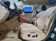 ✅ 2014 Volkswagen Passat SEL Premium • VIN: 1VWCN7A32EC046318 • Lot: 94334875. Listed on Copart with 110,181 mi. Free auction sales archive from the USA and detailed vehicle history report at DreamBid. Image 7.