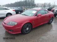 ✅ 2006 Hyundai Tiburon GS • VIN: KMHHM65D06U194001 • Лот: 43849075. Опубликован ранее на IAAI с пробегом 246 283 миль. Бесплатный доступ к архиву аукционных продаж из США и подробный отчёт об истории автомобиля на DreamBid. Изображение 2.