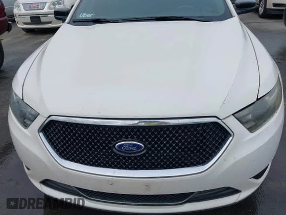 ✅ 2015 Ford Taurus SHO • VIN: 1FAHP2KTXFG158854 • Lot: 43689890. Listed on IAAI with 106,819 mi. Free auction sales archive from the USA and detailed vehicle history report at DreamBid. Image 6.