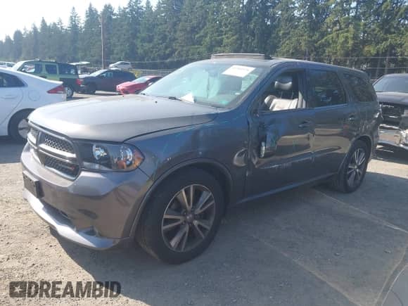 2013 Dodge Durango R/T with VIN 1C4SDHCT3DC687528, listed as a IAAI auction lot 43303576 with 94,220 mi miles and . Bid and sale history available at DreamBid. Image 16.