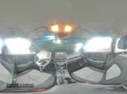 ✅ 2019 Hyundai Kona SE • VIN: KM8K12AA1KU385584 • Лот: 43493824. Опубликован ранее на Copart с пробегом 82 110 миль. Бесплатный доступ к архиву аукционных продаж из США и подробный отчёт об истории автомобиля на DreamBid. Изображение 13.