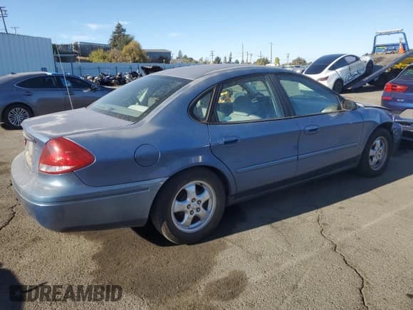 ✅ 2004 Ford Taurus LX • VIN: 1FAFP52204A205096 • Lot: 77357084. Listed on Copart with 46,549 mi. Free auction sales archive from the USA and detailed vehicle history report at DreamBid. Image 3.