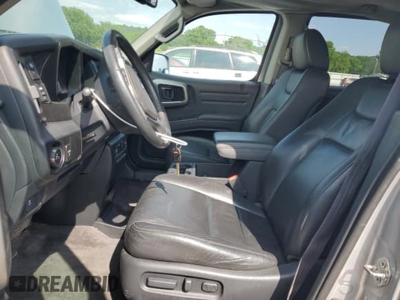 ✅ 2014 Honda Ridgeline SE • VIN: 5FPYK1F69EB013604 • Lot: 57229155. Listed on Copart with 128,358 mi. Free auction sales archive from the USA and detailed vehicle history report at DreamBid. Image 7.