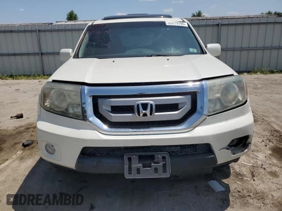 ✅ 2011 Honda Pilot Touring • VIN: 5FNYF3H92BB054569 • Lot: 65279785. Listed on Copart with 186,703 mi. Free auction sales archive from the USA and detailed vehicle history report at DreamBid. Image 5.