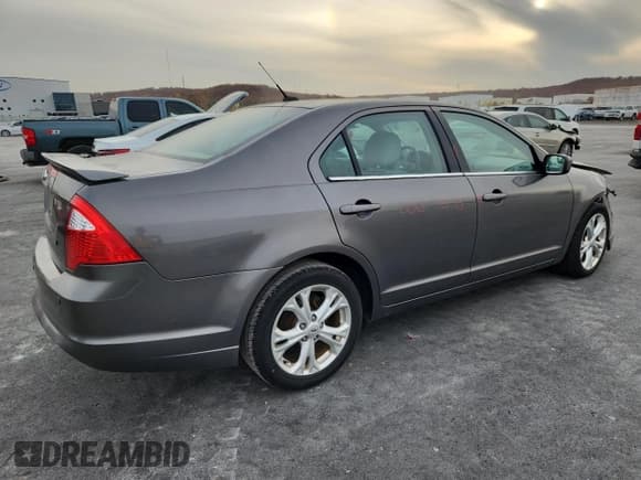 ✅ 2012 Ford Fusion SE • VIN: 3FAHP0HA2CR104253 • Lot: 93069405. Wystawiony na Copart z przebiegiem 84 622 mil. Bezpłatny archiwum sprzedaży aukcyjnych z USA i szczegółowy raport historii pojazdu na DreamBid. Zdjęcie 3.