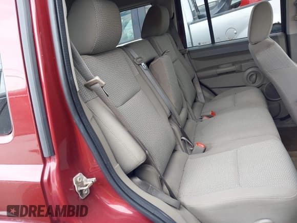 ✅ 2007 Jeep Commander Sport • VIN: 1J8HG48N17C550251 • Lot: 42506732. Listed on IAAI with 143,329 mi. Free auction sales archive from the USA and detailed vehicle history report at DreamBid. Image 8.