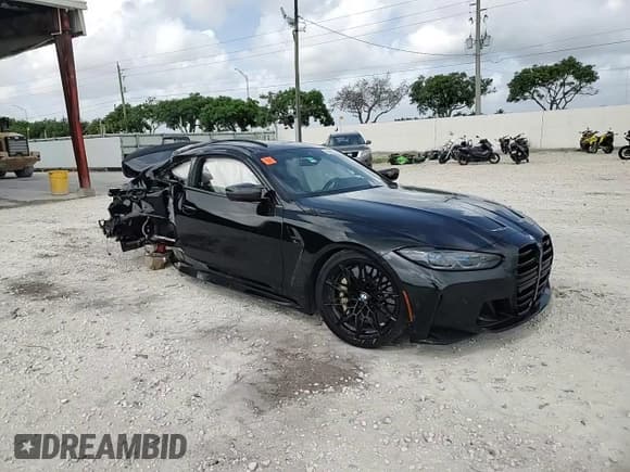 ✅ 2022 BMW M4 Competition • VIN: WBS33AZ08NCJ64057 • Lot: 60067045. Listed on Copart with Not provided. Free auction sales archive from the USA and detailed vehicle history report at DreamBid. Image 14.