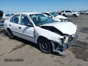 ✅ 1999 Toyota Corolla VE • VIN: 1NXBR12E5XZ199901 • Lot: 42769569. Listed on IAAI with 82,611 mi. Free auction sales archive from the USA and detailed vehicle history report at DreamBid. Image 1.