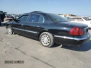 ✅ 2002 Lincoln Continental • VIN: 1LNHM97V92Y685600 • Lot: 68709774. Wystawiony na Copart z przebiegiem 243 688 mil. Bezpłatny archiwum sprzedaży aukcyjnych z USA i szczegółowy raport historii pojazdu na DreamBid. Zdjęcie 2.