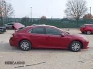 ✅ 2019 Toyota Camry Hybrid LE • VIN: 4T1B31HK9KU517669 • Lot: 43641281. Listed on IAAI with 122,704 mi. Free auction sales archive from the USA and detailed vehicle history report at DreamBid. Image 13.