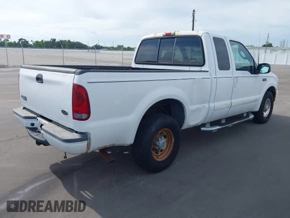 ✅ 2003 Ford F-250 XL • VIN: 1FTNX20L23ED09595 • Lot: 43140702. Listed on IAAI with Not provided. Free auction sales archive from the USA and detailed vehicle history report at DreamBid. Image 4.