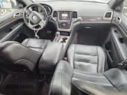 ✅ 2016 Jeep Grand Cherokee Overland • VIN: 1C4RJFCG5GC385029 • Lot: 80877655. Listed on Copart with 111,235 mi. Free auction sales archive from the USA and detailed vehicle history report at DreamBid. Image 8.