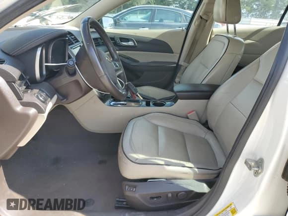 ✅ 2014 Chevrolet Malibu LTZ • VIN: 1G11J5SX6EF217283 • Lot: 69306405. Listed on Copart with 162,026 mi. Free auction sales archive from the USA and detailed vehicle history report at DreamBid. Image 7.