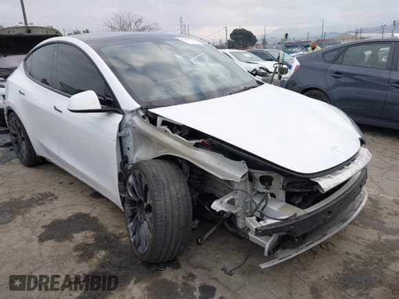 ✅ 2022 Tesla Model Y Performance • VIN: 7SAYGDEF7NF403813 • Lot: 41450646. Listed on IAAI with 76,546 mi. Free auction sales archive from the USA and detailed vehicle history report at DreamBid. Image 6.