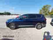 2019 Hyundai Santa Fe SE z VIN 5NMS2CAD8KH128415, wystawiony jako IAAI lot #43334550 z przebiegiem 71 478 mil mil oraz . Historia ofert i sprzedaży dostępna na DreamBid. Obrazek 14.