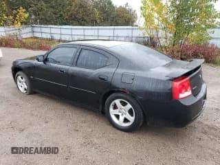 ✅ 2010 Dodge Charger SXT • VIN: 2B3CA3CV3AH249037 • Лот: 87374495. Опубликован ранее на Copart с пробегом 262 754 миль. Бесплатный доступ к архиву аукционных продаж из США и подробный отчёт об истории автомобиля на DreamBid. Изображение 2.