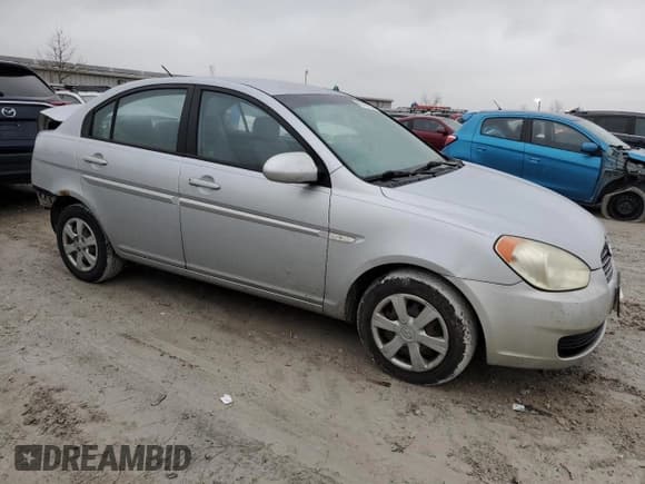 ✅ 2007 Hyundai Accent GLS • VIN: KMHCN46C77U122585 • Лот: 86186834. Опубликован ранее на Copart с пробегом 165 576 миль. Бесплатный доступ к архиву аукционных продаж из США и подробный отчёт об истории автомобиля на DreamBid. Изображение 4.