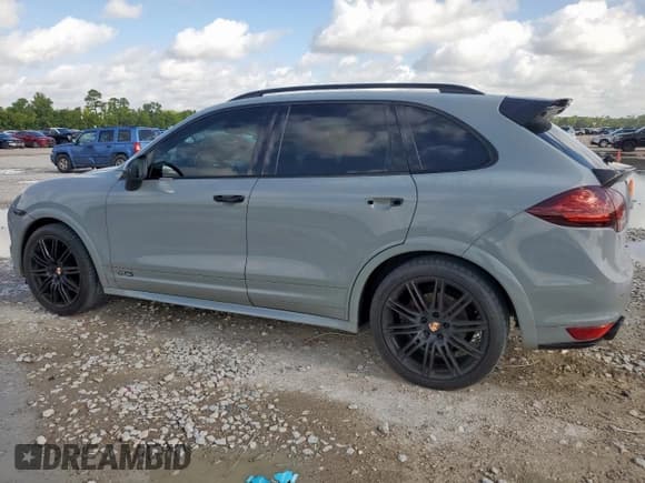 ✅ 2014 Porsche Cayenne GTS • VIN: WP1AD2A2XELA77287 • Lot: 69069815. Listed on Copart with 125,138 mi. Free auction sales archive from the USA and detailed vehicle history report at DreamBid. Image 2.