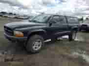 2003 Dodge Dakota Sport z VIN 1D7HG32N43S102313, wystawiony jako Copart lot #70307144 z przebiegiem 139 079 mil mil oraz Szkoda całkowita • Salvage title. Historia ofert i sprzedaży dostępna na DreamBid. Obrazek 1.