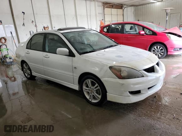 ✅ 2004 Mitsubishi Lancer Ralliart • VIN: JA3AJ66F64U029144 • Лот: 77437234. Опубликован ранее на Copart с пробегом 158 049 миль. Бесплатный доступ к архиву аукционных продаж из США и подробный отчёт об истории автомобиля на DreamBid. Изображение 4.