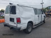 ✅ 2014 Ford Econoline Cargo Commercial • VIN: 1FTNE2EW6EDA43418 • Lot: 43246745. Listed on IAAI with 104,124 mi. Free auction sales archive from the USA and detailed vehicle history report at DreamBid. Image 4.