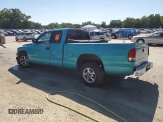 ✅ 1998 Dodge Dakota SLT • VIN: 1B7GL22X6WS569850 • Lot: 52331815. Wystawiony na Copart z przebiegiem 241 821 mil. Bezpłatny archiwum sprzedaży aukcyjnych z USA i szczegółowy raport historii pojazdu na DreamBid. Zdjęcie 2.