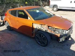 2016 Hyundai Veloster Turbo z VIN KMHTC6AE5GU260975, wystawiony jako IAAI lot #43428690 z przebiegiem 72 497 mil mil oraz . Historia ofert i sprzedaży dostępna na DreamBid. Obrazek 1.