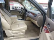 ✅ 2010 Chevrolet Suburban LT • VIN: 1GNUKJE33AR117502 • Lot: 43082827. Listed on IAAI with 200,098 mi. Free auction sales archive from the USA and detailed vehicle history report at DreamBid. Image 5.