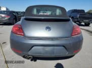 ✅ 2014 Volkswagen Beetle 2.5L • VIN: 3VW5P7AT4EM803303 • Лот: 82496725. Опубликован ранее на Copart с пробегом 92 682 миль. Бесплатный доступ к архиву аукционных продаж из США и подробный отчёт об истории автомобиля на DreamBid. Изображение 6.