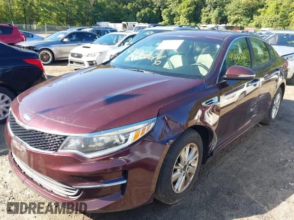 ✅ 2018 Kia Optima LX • VIN: 5XXGT4L36JG221377 • Lot: 43106826. Listed on IAAI with 154,766 mi. Free auction sales archive from the USA and detailed vehicle history report at DreamBid. Image 2.