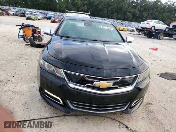 ✅ 2014 Chevrolet Impala LTZ • VIN: 1G1155S34EU140555 • Лот: 77123664. Опубликован ранее на Copart с пробегом 121 340 миль. Бесплатный доступ к архиву аукционных продаж из США и подробный отчёт об истории автомобиля на DreamBid. Изображение 5.