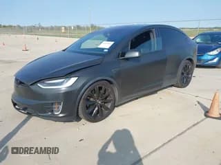 ✅ 2016 Tesla Model X 70D • VIN: 5YJXCBE27GF014176 • Lot: 43441061. Listed on IAAI with 94,129 mi. Free auction sales archive from the USA and detailed vehicle history report at DreamBid. Image 2.
