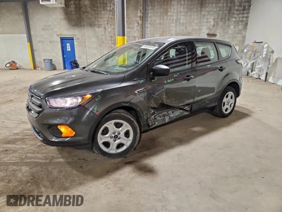✅ 2018 Ford Escape S • VIN: 1FMCU0F73JUB94261 • Lot: 95725975. Listed on Copart with 82,485 mi. Free auction sales archive from the USA and detailed vehicle history report at DreamBid. Image 1.