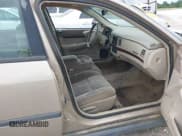 ✅ 2002 Chevrolet Impala • VIN: 2G1WF55E829112959 • Lot: 42874334. Wystawiony na IAAI z przebiegiem 238 416 mil. Bezpłatny archiwum sprzedaży aukcyjnych z USA i szczegółowy raport historii pojazdu na DreamBid. Zdjęcie 5.