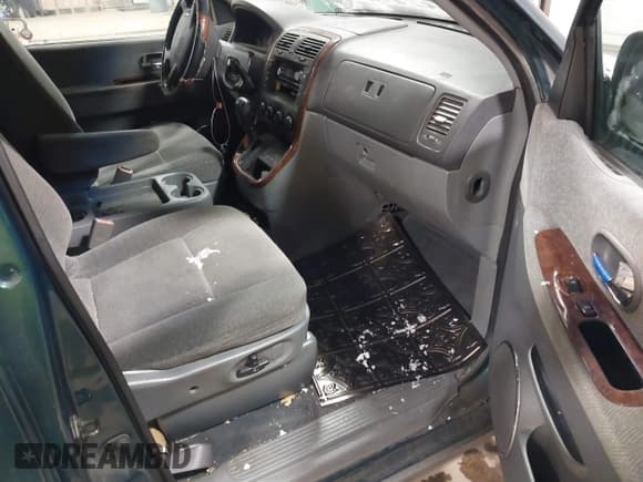 ✅ 2003 Kia Sedona LX • VIN: KNDUP131336390410 • Lot: 41602426. Wystawiony na IAAI z przebiegiem 170 613 mil. Bezpłatny archiwum sprzedaży aukcyjnych z USA i szczegółowy raport historii pojazdu na DreamBid. Zdjęcie 5.