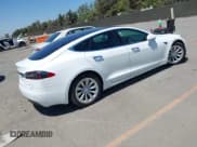 ✅ 2017 Tesla Model S 60 • VIN: 5YJSA1E19HF215502 • Lot: 42667040. Listed on IAAI with 74,627 mi. Free auction sales archive from the USA and detailed vehicle history report at DreamBid. Image 4.