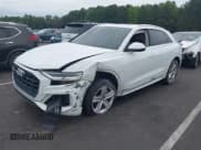 ✅ 2019 Audi Q8 Premium • VIN: WA1AVAF16KD009772 • Лот: 43178857. Опубликован ранее на IAAI с пробегом 128 937 миль. Бесплатный доступ к архиву аукционных продаж из США и подробный отчёт об истории автомобиля на DreamBid. Изображение 2.