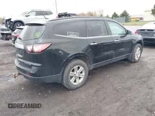 2014 Chevrolet Traverse LT z VIN 1GNKRGKD3EJ144920, wystawiony jako IAAI lot #43500536 z przebiegiem 210 276 mil mil oraz . Historia ofert i sprzedaży dostępna na DreamBid. Obrazek 4.