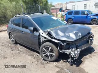 ✅ 2023 Subaru Impreza Premium • VIN: 4S3GTAV65P3713767 • Lot: 42793023. Listed on IAAI with 17,016 mi. Free auction sales archive from the USA and detailed vehicle history report at DreamBid. Image 1.