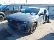 ✅ 2024 Mazda CX-50 S Preferred • VIN: 7MMVABBM2RN217211 • Lot: 43410951. Listed on IAAI with 14,009 mi. Free auction sales archive from the USA and detailed vehicle history report at DreamBid. Image 2.