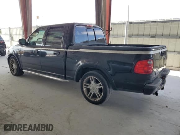 ✅ 2003 Ford F-150 Harley-Davidson • VIN: 1FTRW07343KD83293 • Lot: 55600275. Listed on Copart with 176,233 mi. Free auction sales archive from the USA and detailed vehicle history report at DreamBid. Image 2.