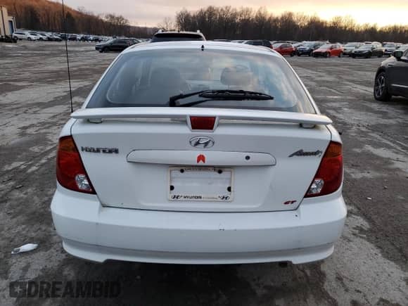 2003 Hyundai Accent GL with VIN KMHCG35C53U258469, listed as a Copart auction lot 82977294 with 99,136 mi miles and Clean title. Bid and sale history available at DreamBid. Image 6.
