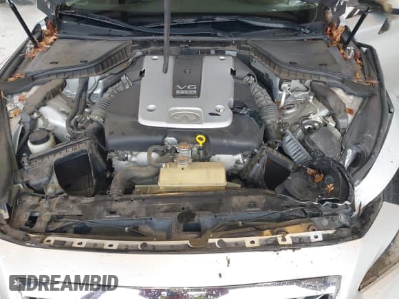 ✅ 2015 Infiniti Q50 Premium • VIN: JN1BV7AP3FM335210 • Lot: 43711853. Listed on IAAI with 102,947 mi. Free auction sales archive from the USA and detailed vehicle history report at DreamBid. Image 10.