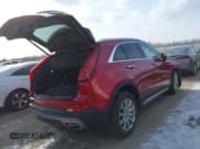 ✅ 2021 Cadillac XT4 FWD Premium Luxury • VIN: 1GYFZCR44MF019607 • Лот: 41363064. Опубликован ранее на IAAI с пробегом 24 364 миль. Бесплатный доступ к архиву аукционных продаж из США и подробный отчёт об истории автомобиля на DreamBid. Изображение 4.