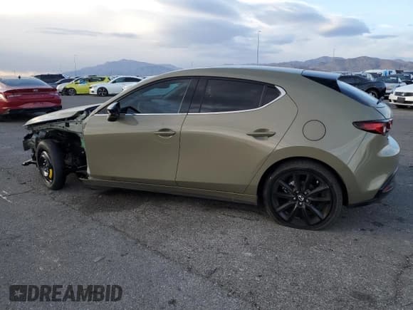 ✅ 2024 Mazda 3 Carbon Edition • VIN: JM1BPBYY3R1719924 • Лот: 43079785. Опубликован ранее на Copart с пробегом 1 207 миль. Бесплатный доступ к архиву аукционных продаж из США и подробный отчёт об истории автомобиля на DreamBid. Изображение 2.