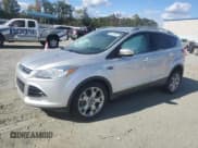 ✅ 2014 Ford Escape Titanium • VIN: 1FMCU0J98EUD24758 • Лот: 86516345. Опубликован ранее на Copart с пробегом 132 126 миль. Бесплатный доступ к архиву аукционных продаж из США и подробный отчёт об истории автомобиля на DreamBid. Изображение 1.