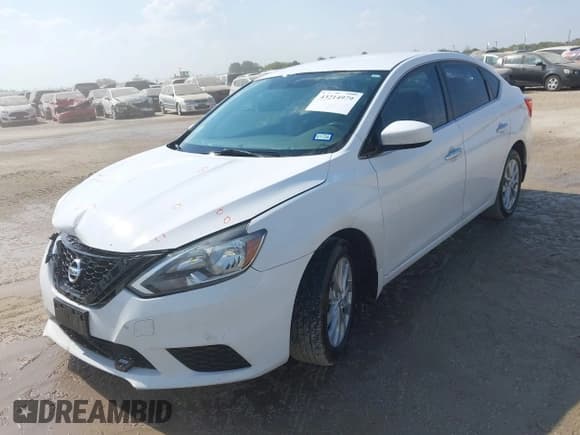 ✅ 2018 Nissan Sentra S • VIN: 3N1AB7AP1JY294117 • Lot: 43214979. Listed on IAAI with 106,672 mi. Free auction sales archive from the USA and detailed vehicle history report at DreamBid. Image 2.