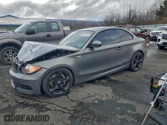 ✅ 2011 BMW 1 Series 135i • VIN: WBAUC9C54BVM09206 • Lot: 95210915. Listed on Copart with 141,906 mi. Free auction sales archive from the USA and detailed vehicle history report at DreamBid. Image 1.