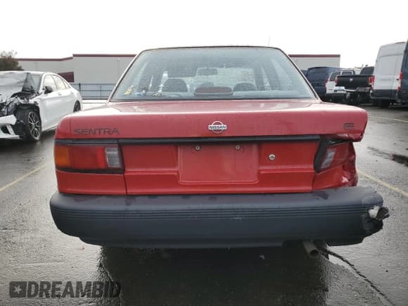 ✅ 1992 Nissan Sentra E • VIN: JN1EB31P1NU121278 • Lot: 84889294. Listed on Copart with 128,445 mi. Free auction sales archive from the USA and detailed vehicle history report at DreamBid. Image 6.