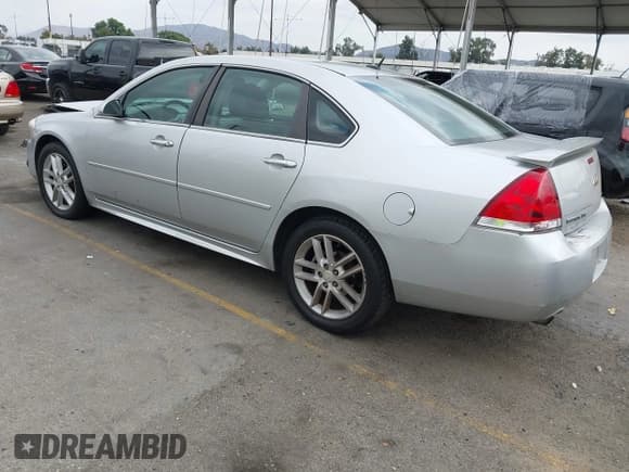 ✅ 2016 Chevrolet Impala LTZ • VIN: 2G1WC5E34G1132915 • Lot: 43325578. Listed on IAAI with 144,317 mi. Free auction sales archive from the USA and detailed vehicle history report at DreamBid. Image 3.